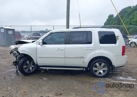 2015 Honda Pilot Touring z USA, uszkodzony, nr VIN 5FNYF4H91FB053621